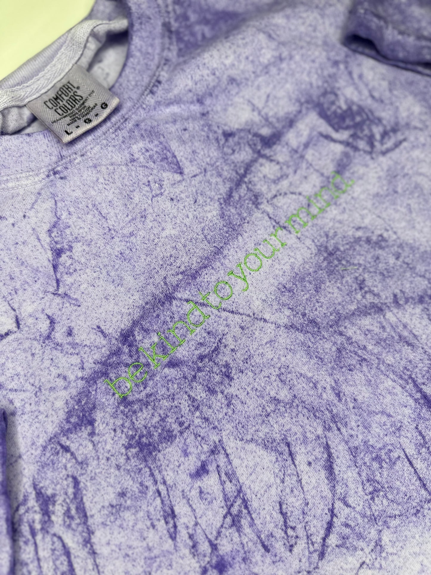 Be kind to your mind embroidered on a Amethyst Comfort Colors tshirt