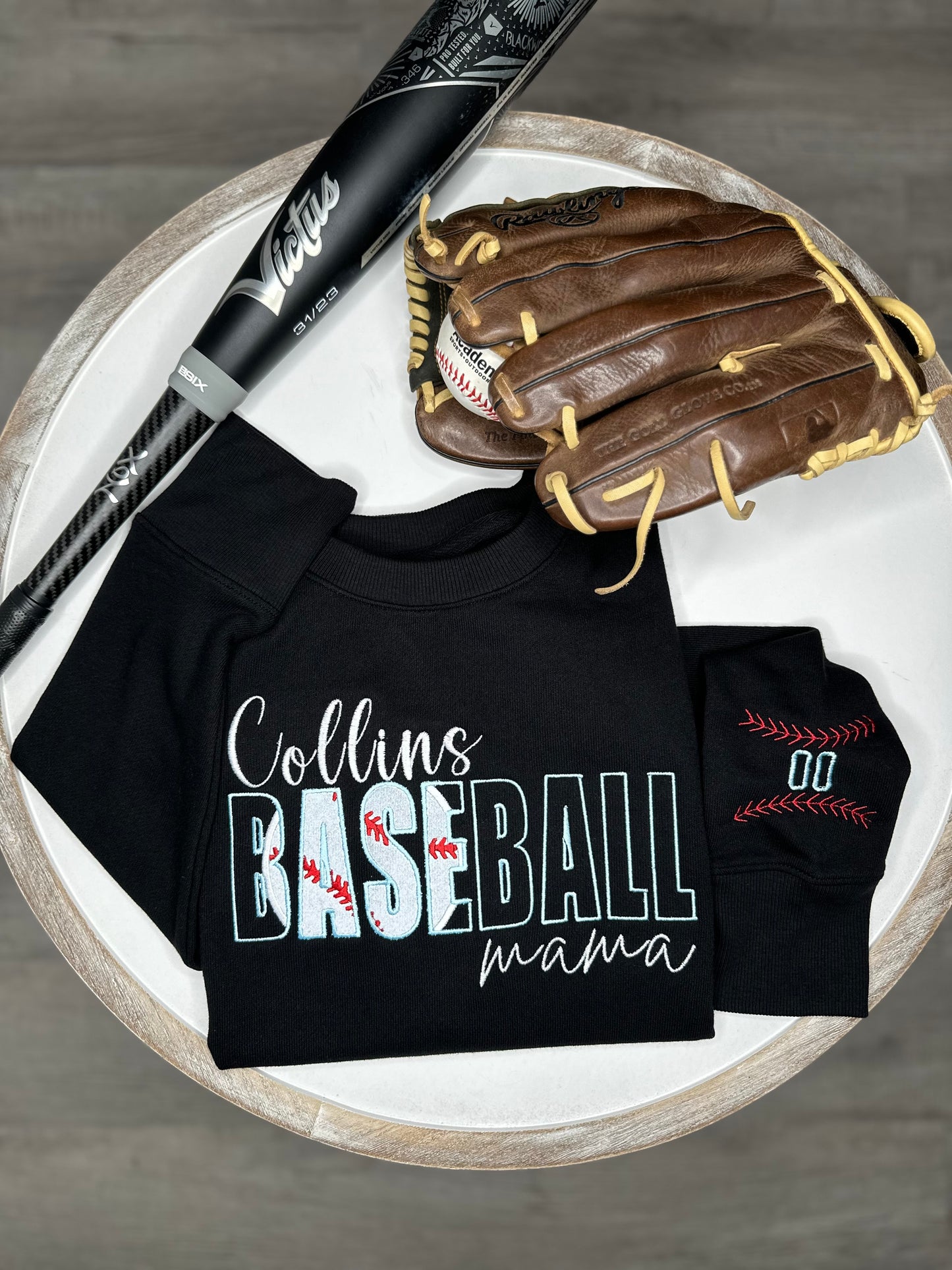 Custom Baseball Mama crewneck sweatshirt with a personalized sleeve.